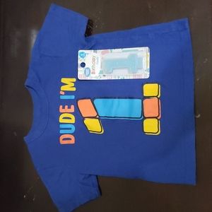 Boy turning 1 Year Old with Birthday candle